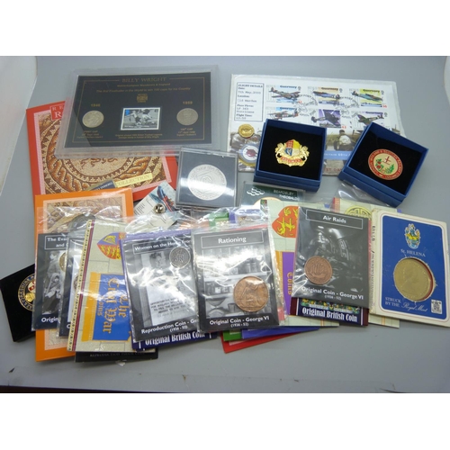 914 - A collection of coins and medallions, some in packs and some replica