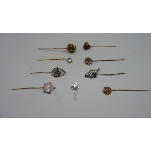 956 - Hat pins including silver, one lacking cabochon garnet