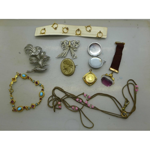 973 - Costume jewellery, amethyst quartz buttons, a compass fob and a watch fob