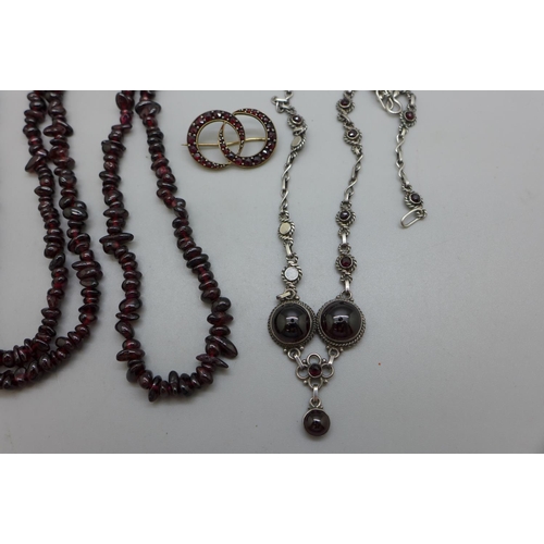 984 - Two garnet necklaces and brooch