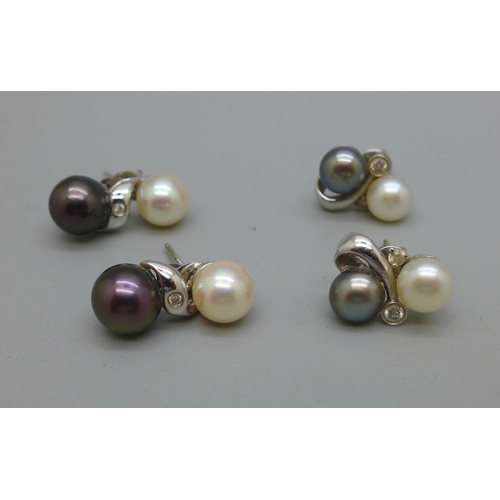 986 - Two pairs of 9ct white gold, white stone and pearl earrings, 6.9g