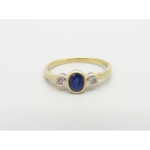 995 - A 9ct gold, sapphire and diamond ring, 1.8g, N