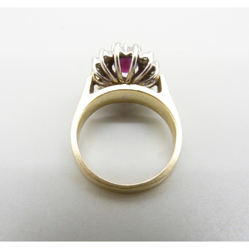 996 - A 14k gold, ruby and diamond ring, 8.5g, P