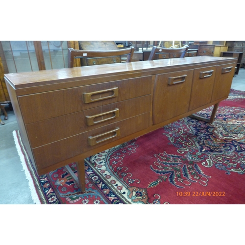 74 - A Beautility teak sideboard