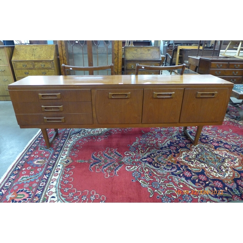 74 - A Beautility teak sideboard