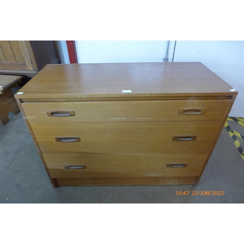 99 - A teak chest of drawers