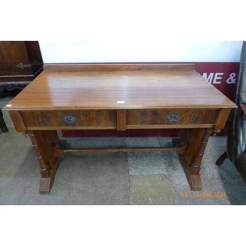 109 - A Victorian mahogany two drawer writing table