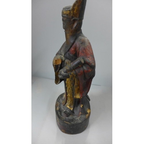 790 - A 19th Century carved wooden polychrome figure of a wise man/Chinese elder, lacking one hand, 31cm