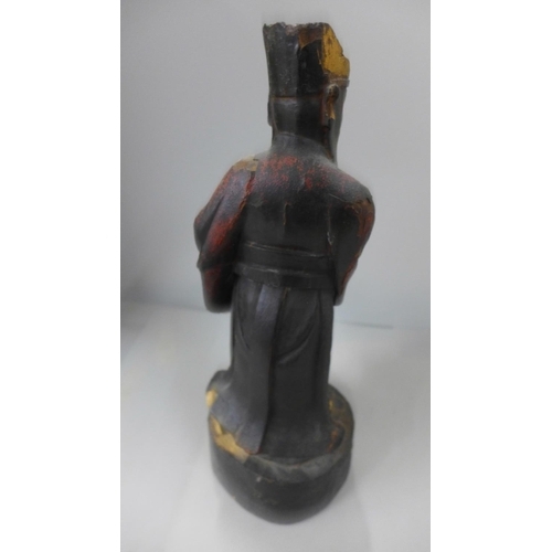 790 - A 19th Century carved wooden polychrome figure of a wise man/Chinese elder, lacking one hand, 31cm