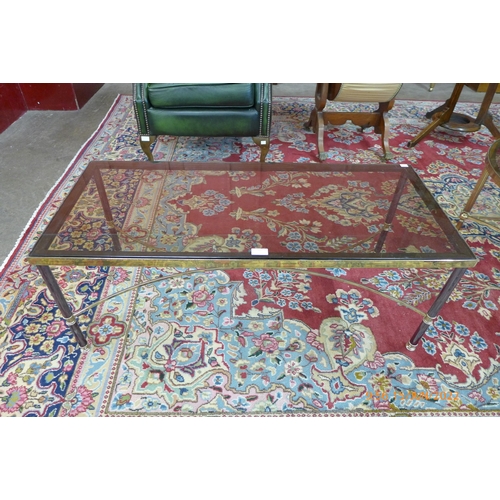 164 - An Italian brass and glass topped rectangular coffee table