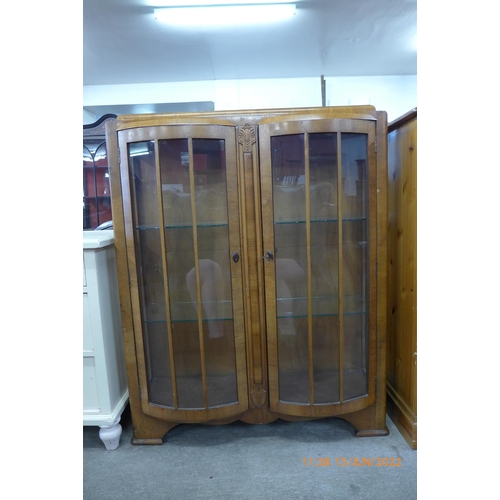 189 - A walnut two door display cabinet