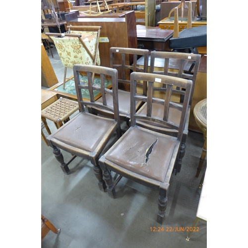 214 - A set of four oak dining chairs