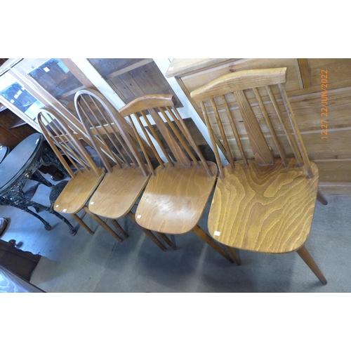 218 - Four beech kitchen chairs