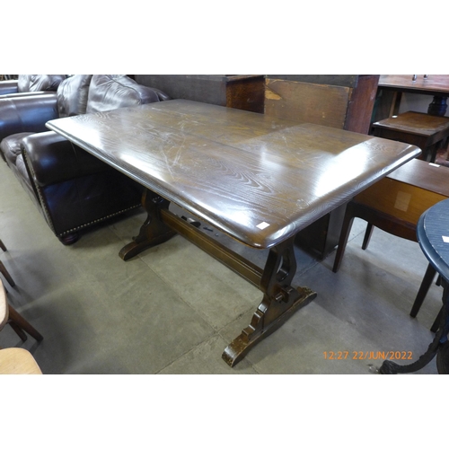 219 - An elm refectory table