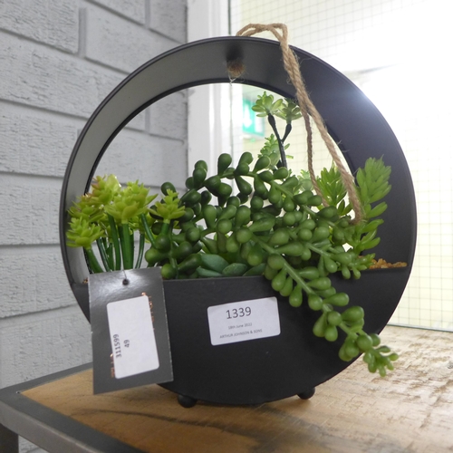 1339 - A display of artificial succulents in a round metal hanging pot, H 20cms (67444212)   #