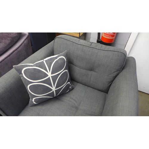 1380 - A grey upholstered armchair