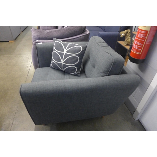 1380 - A grey upholstered armchair