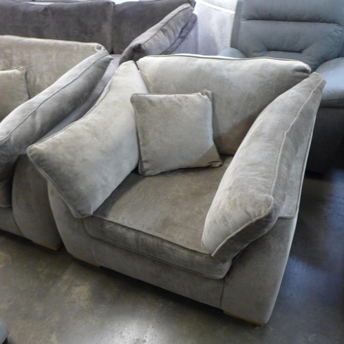 1507 - A Barker and Stonehouse mink upholstered oversized armchair with oak feet - RRP £1175