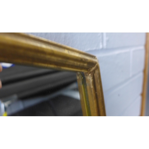 1518 - A gold framed mirror