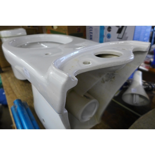 2073 - Unused white ceramic toilet bowl