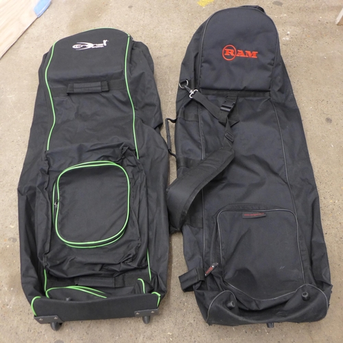 2086 - Two golf bag haulage holdalls for air stowage of clubs and approx 50 golf balls