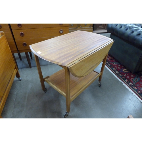 102 - A Danish teak and tiled top coffee table and a dropleaf trolley