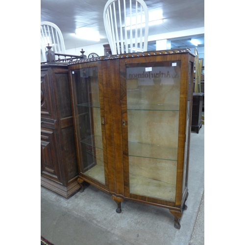 114 - A walnut two door display cabinet