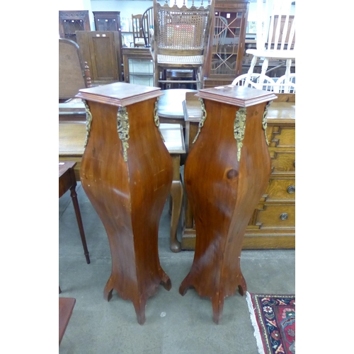 116 - A pair of French style beech and gilt mounted pedestals