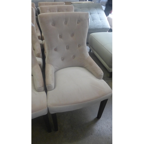 1407 - A set of six dusky pink upholstered dining chairs with black legs