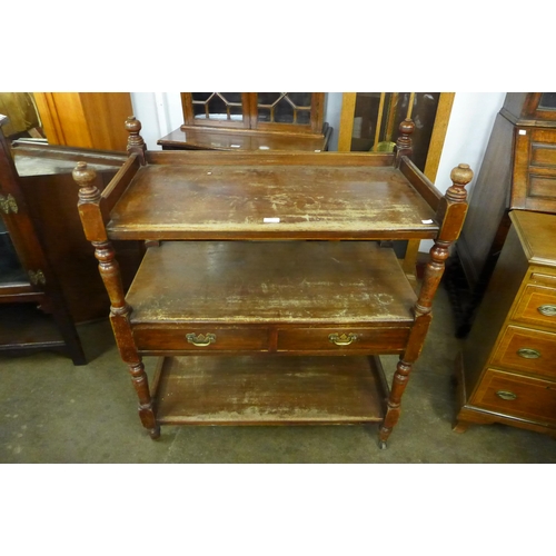 132 - A Victorian mahogany three tier buffet