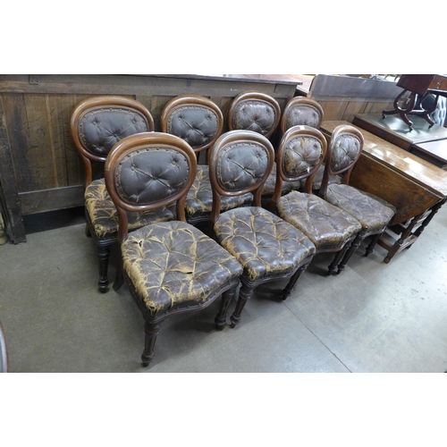 136 - A set of eight Victorian mahogany and leather upholstered ballon back dining chairs