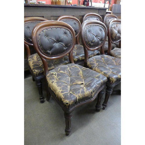 136 - A set of eight Victorian mahogany and leather upholstered ballon back dining chairs