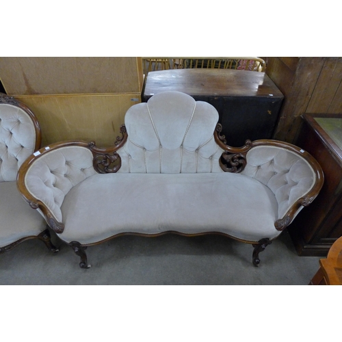 143 - An early Victorian carved walnut and fabric upholstered settee and pair of matching lady's and gentl... 