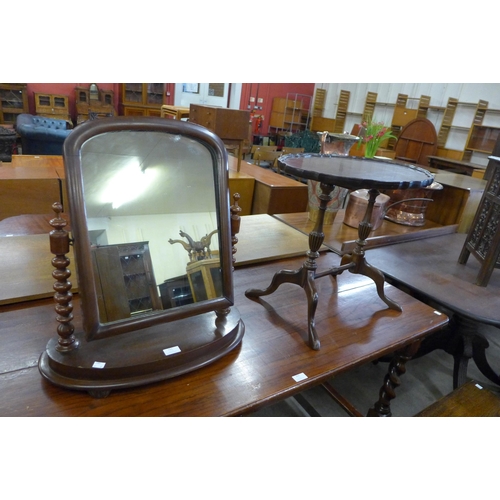 151 - A mahogany toilet mirror and an occasional table