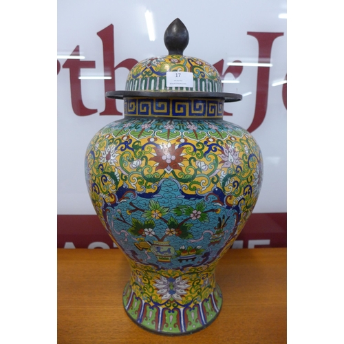 17 - An oriental champleve enamelled vase and cover