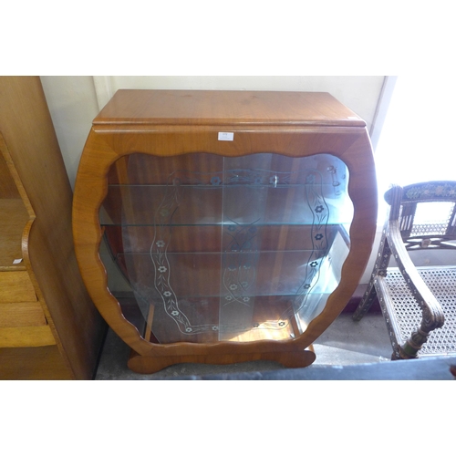 172 - An Art Deco walnut display cabinet