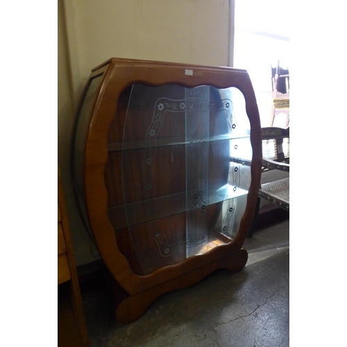 172 - An Art Deco walnut display cabinet