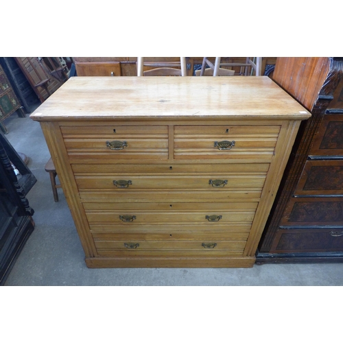 174 - A Victorian ash chest of drawers