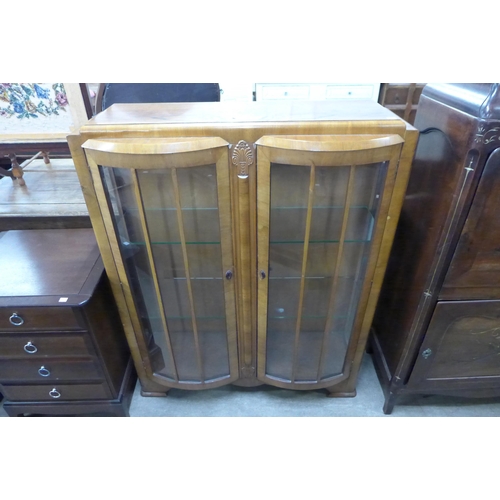 189 - A walnut two door display cabinet