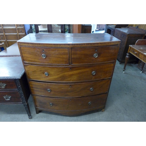 193 - A George III inlaid mahogany bow front chest of drawers