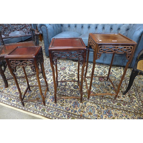 2 - A late 19th/early 20th Century Chinese hardwood nest of tables