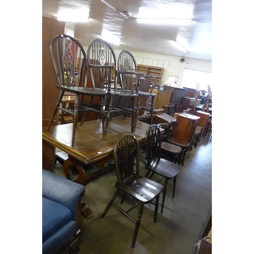 209 - A Harlequin set of five beech wheelback kitchen chairs