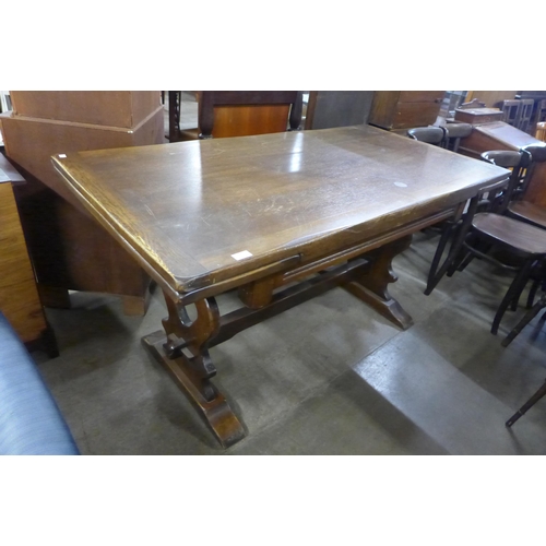 210 - An oak draw leaf refectory table