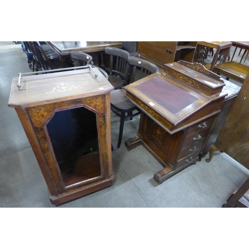 212 - A Victorian inlaid walnut Davenport and a music cabinet