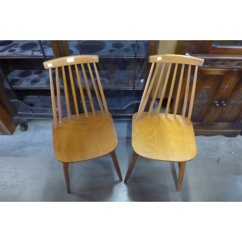 213 - A pair of beech kitchen chairs