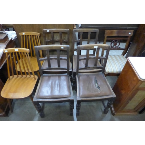 214 - A set of four oak dining chairs