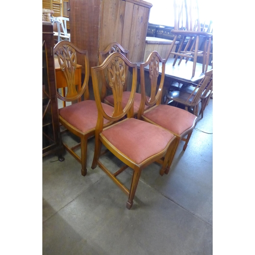 216 - A set of four Hepplewhite style mahogany chairs