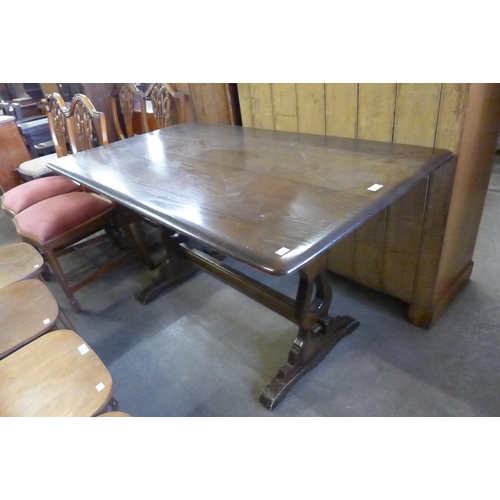 219 - An elm refectory table