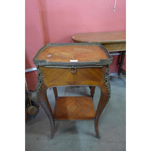 24 - A 19th Century French walnut and ormolu mounted gueridon table