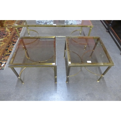 35 - A pair of Italian brass and glass topped coffee tables